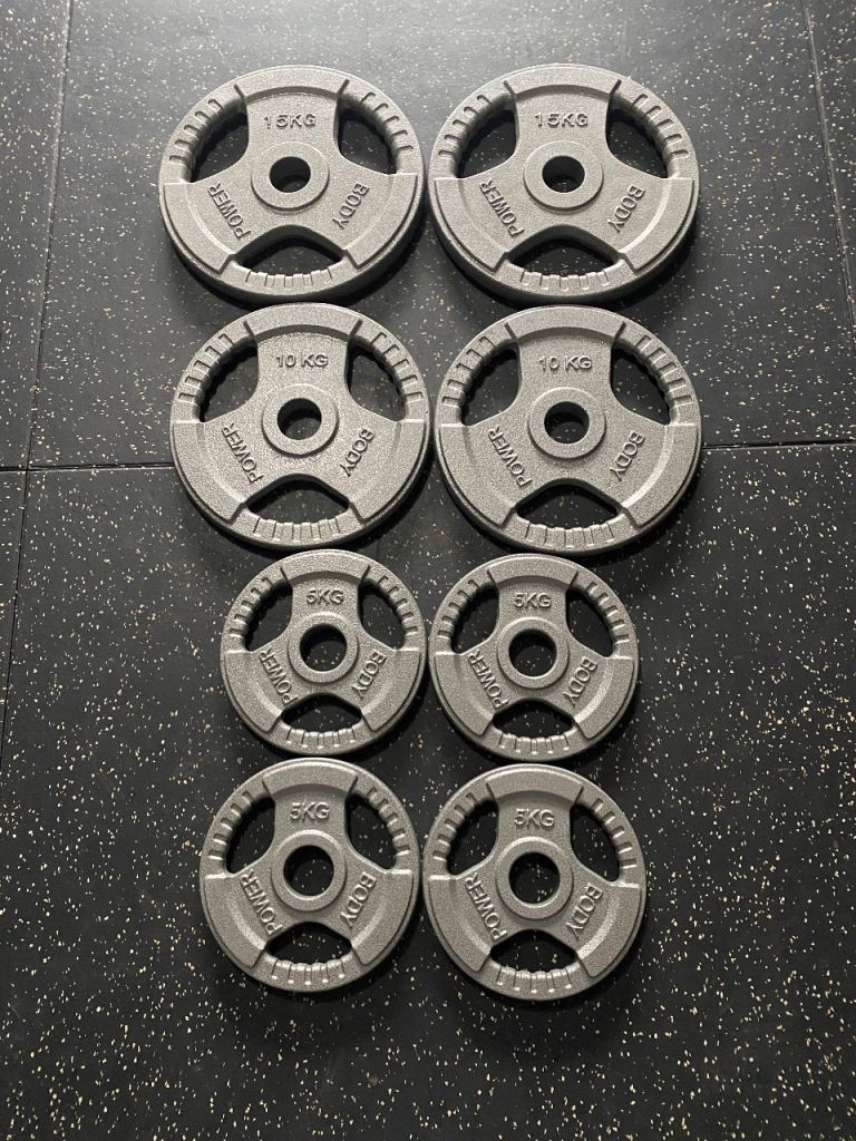 Used Bodypower cast iron weight set 70kg total Weight Plates — photo 2